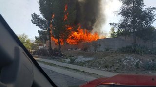 Crews battle eastside house fire